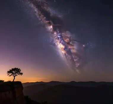 Starry Night Sky Over Cliff with Milky Way galaxy