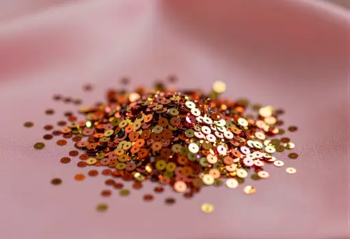 Colorful Sequins Pile Close-Up vibrant sparkle