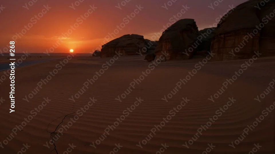 Desert Landscape at Sunset orange pink sky rock formation