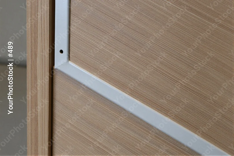 Wooden Door with Metal Frame Close-Up textured wood