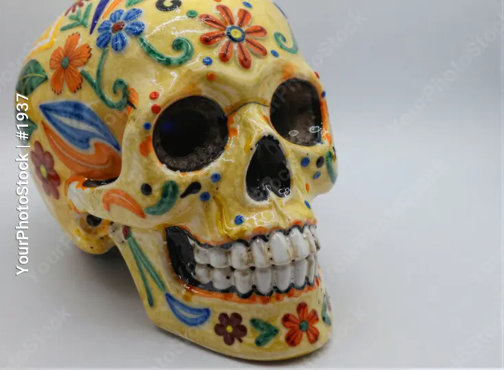 Bright Yellow Skull Figurine with Floral Designs mexico