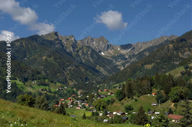 Mountainous Landscape with Blue Sky and Green Trees