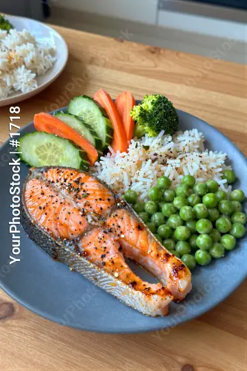 Blue Plate with Salmon, Rice and Vegetables cooked salmon