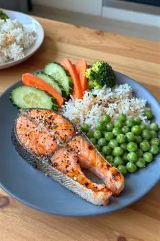 Blue Plate with Salmon, Rice and Vegetables cooked salmon