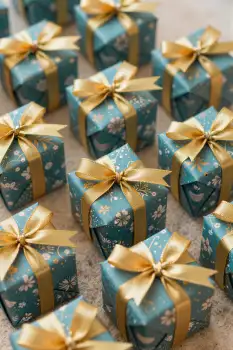 Scattered Gift Boxes on Beige Surface wrapped gifts