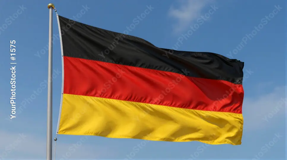 High-flying German Flag Against Clear Sky black red yellow