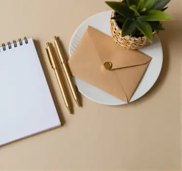 Desk Setup with Succulent Plant, Notebook, Envelope and Pens