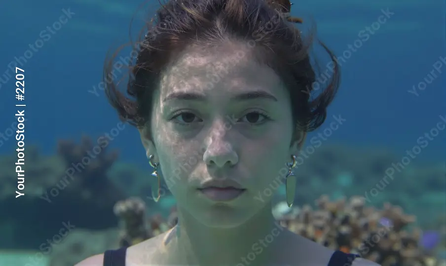 Young Woman Underwater Portrait Serious Expression