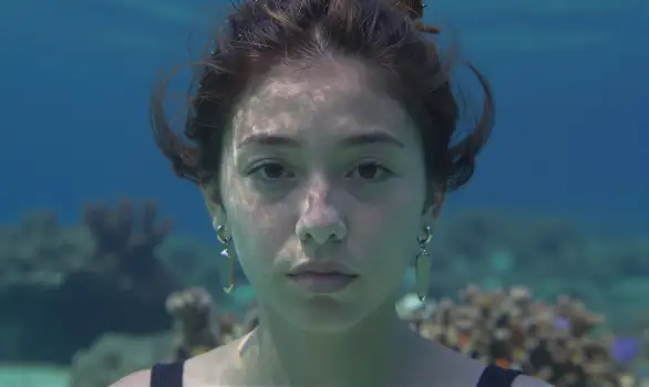 Young Woman Underwater Portrait Serious Expression
