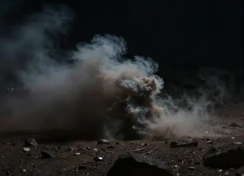 Dramatic Cloud of White Smoke Rising from Ground