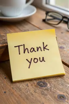 Thank You Note on Wooden Table sticky note coffee