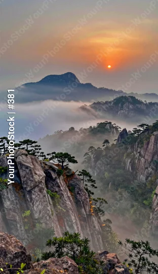 Mountain Range at Sunrise with Fog landscape orange sky