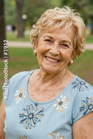 Elderly Woman Smiling in Park portrait happy relaxed