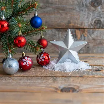 Christmas Tree and Star on Wooden Table holiday