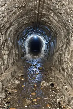 Rock Tunnel Walk Interior with River nature adventure