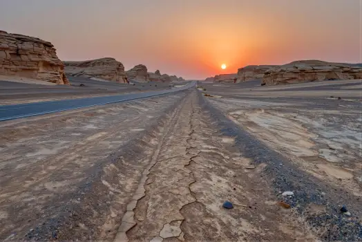 Desert Road at Sunset dirt rock formations jagged