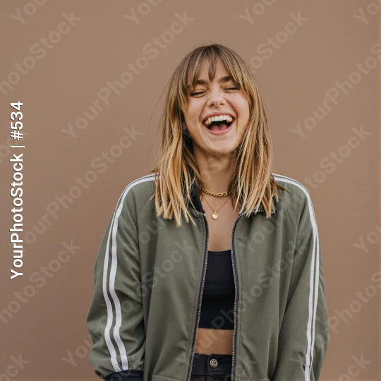 Young Woman Laughing in Playful Mood blonde hair