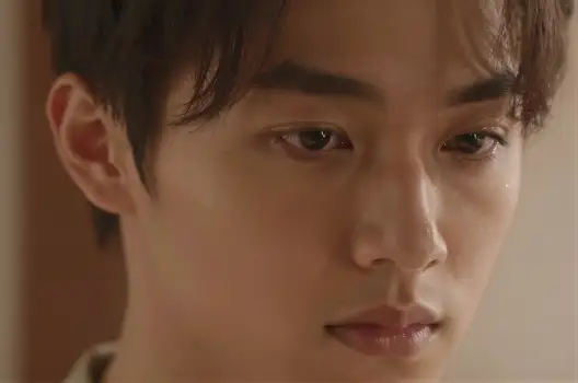 Serious Young Man with Contemplative Expression