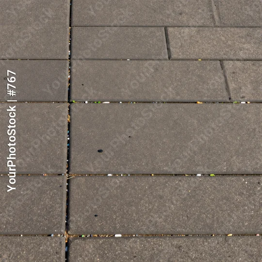 Close-up of tiled floor with grid pattern overlapping tiles