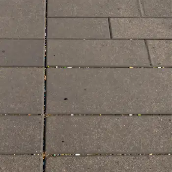 Close-up of tiled floor with grid pattern overlapping tiles