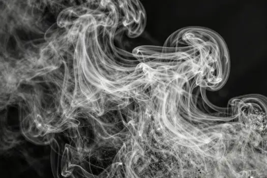 Mysterious Black and White Smoke Swirling Upwards