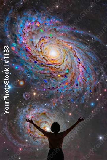 Silhouette Person Stretched Wide in Front of Colorful Spiral Galaxy