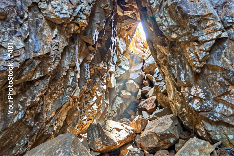 Rocky Cave Entrance with Bright Sunlight boulders