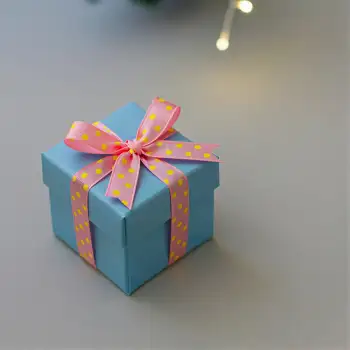 Cheerful Festive Gift Box with Polka-Dot Ribbon