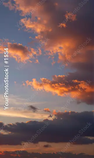 Sunset with Vibrant Colors Over Scattered Clouds