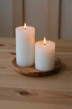Lit Candles on Wooden Tray table home decor event setting
