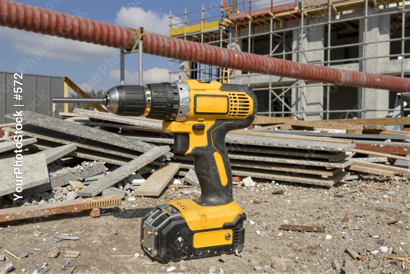 Cordless Drill on Construction Site rubble debris