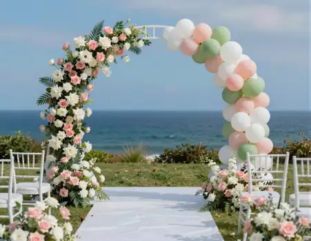 Outdoor Wedding Ceremony Setup with Balloon Arch and Ocean View