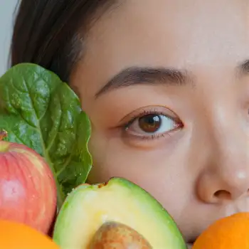 Young Woman with Fruits Close-Up vegetables apple