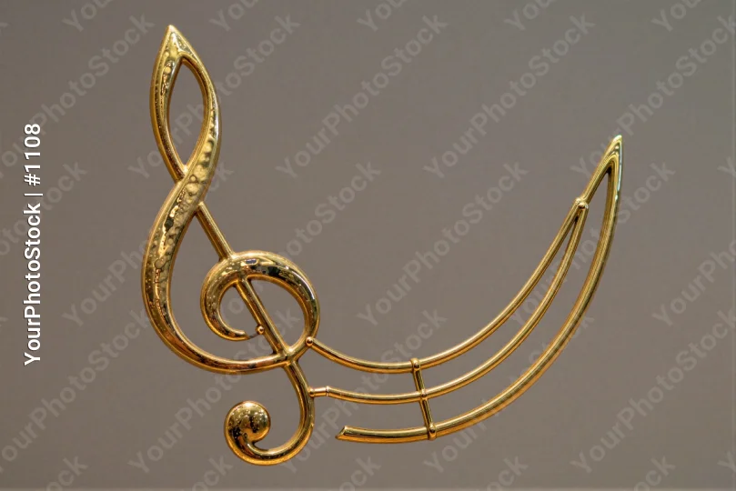 Gold Treble Clef Crescent Moon Close-Up metal object
