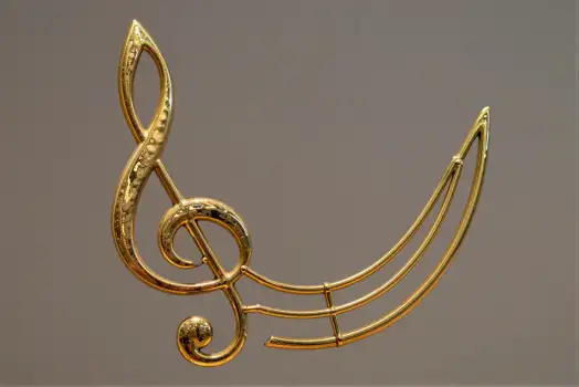 Gold Treble Clef Crescent Moon Close-Up metal object