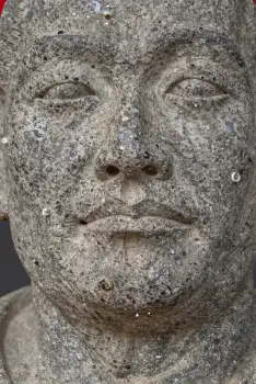 Peaceful Stone Face Sculpture serene man's head