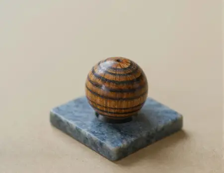 Wooden Striped Object on Blue Marble Base beige background