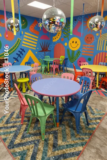 Colorful Children's Playroom with Mural and Disco Balls
