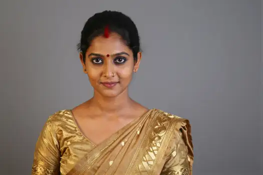 Young Indian Woman in Traditional Saree Smiling
