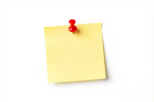 Yellow Sticky Note with Red Pin on White Background