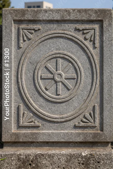 Weathered Stone Block with Circular Design concentric circles
