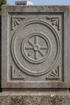 Weathered Stone Block with Circular Design concentric circles