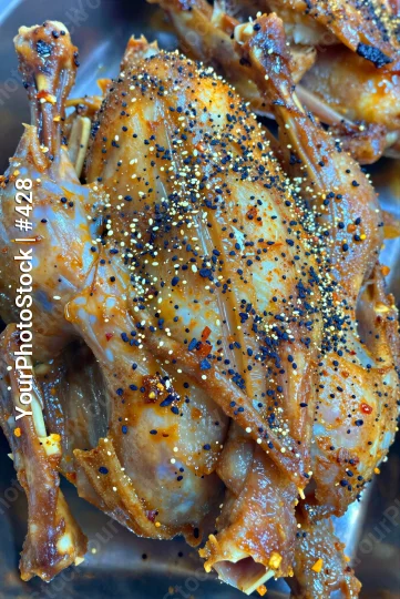 Roasted Chicken Drumsticks Close-Up seasoned black pepper