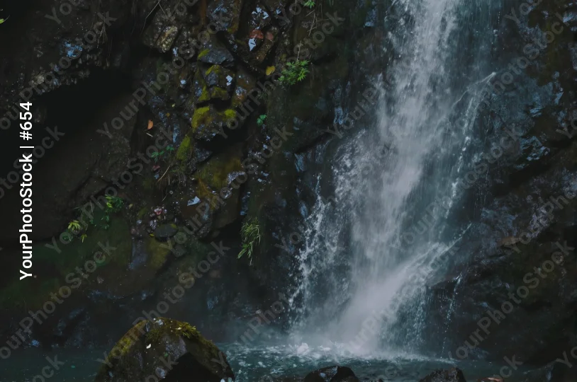 Serene Waterfall Over Rocky Cliff peaceful moss