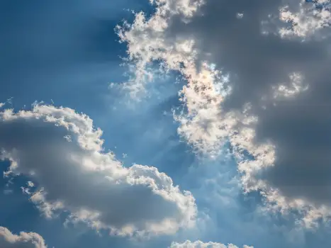 Cloudy Sky with Wave-like Clouds and Sunlight