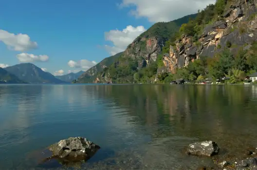 Serene Lake Reflections in Clear Blue Sky mountains