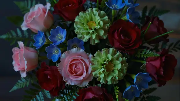 Close-up of a beautiful bouquet of mixed flowers including roses,