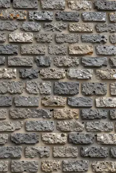Weathered Brick Wall Close-Up mortar cracks crevices