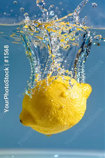 Fresh Lemon Falling into Water splash freshness