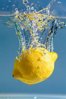 Fresh Lemon Falling into Water splash freshness